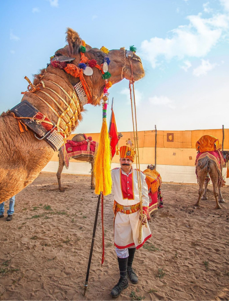Camel and Indian men - visit Jaiselmer